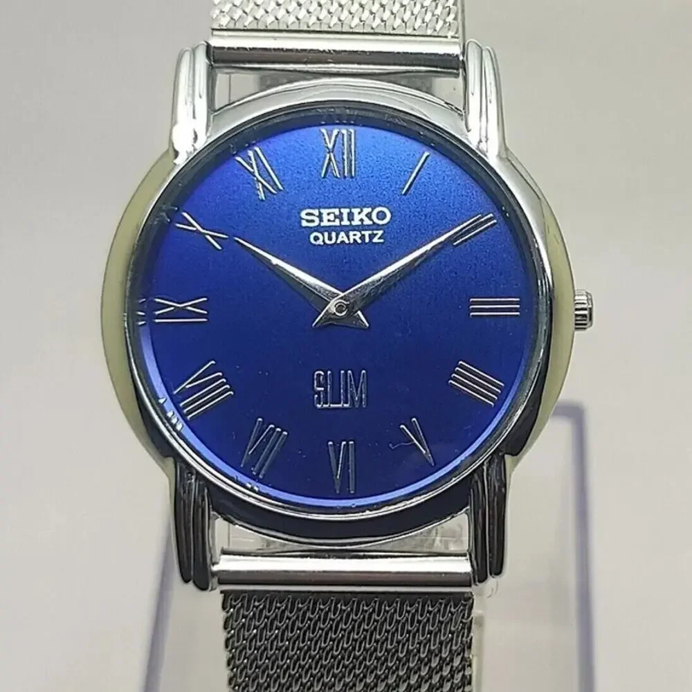 Vintage Style Seiko Quartz Mens Silver Watch & Blue accents W/ Metal Strap